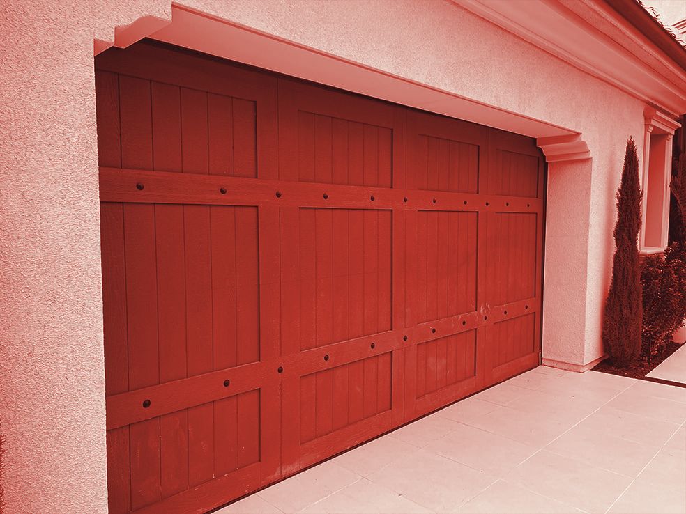 Carriage-style garage door installed by Glory Garage Door Services
